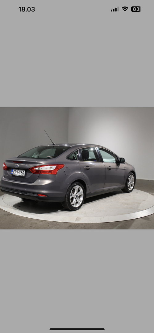 Ford Focus 1,6 125 hv M5 4-ovinen Trend 2011, photo 4/5